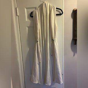 Anthropology cover-up with pockets. You can put it over anything.